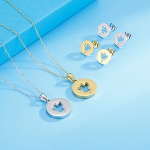 Elegant stainless steel clover jewelry set with necklace and stud earrings in gold and silver