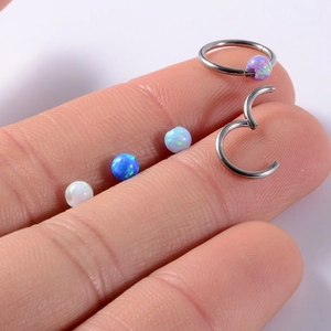 Polished stainless steel industrial barbell with colorful opal beads for piercings