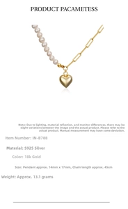 Detail of 925 sterling silver heart necklace with asymmetric pearls and 18k gold plating