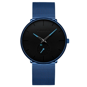 Detail of blue Milanese mesh strap and black dial on a men's luxury quartz watch