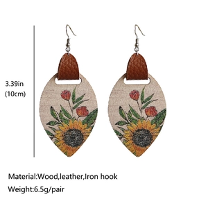 Bohemian sunflower wood and leather drop earrings on white background with dimensions