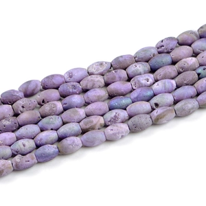 Detailed view of purple geode agate beads with natural druzy textures for jewelry making