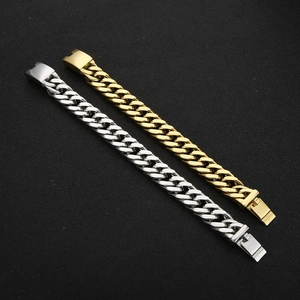 Detailed view of polished gold and silver Cuban link bracelets with square press buckles