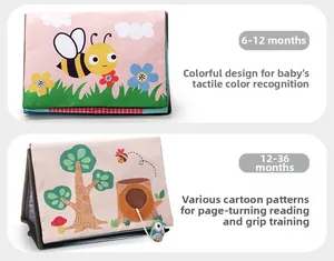 Detail showing bee illustrations and owl grip pendant on baby soft fabric book