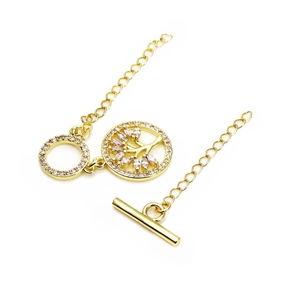 Detailed view of gold-plated Tree of Life pendant with cubic zirconia and OT clasp