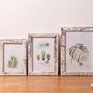 Rustic wood photo frame set in various sizes with vintage distressed finish for tabletop display