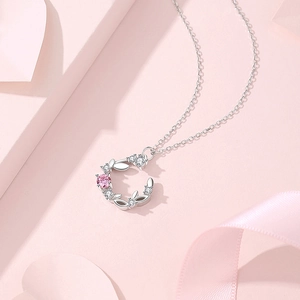 Elegant S925 silver crescent moon necklace with pink gemstone and zircon wreath