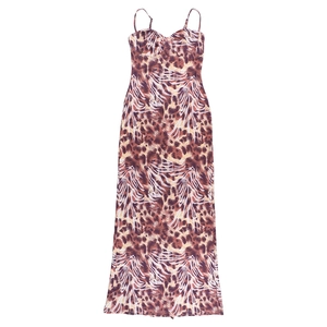 Detailed view of the brown leopard print dress featuring a deep V-neck and slim backless cut