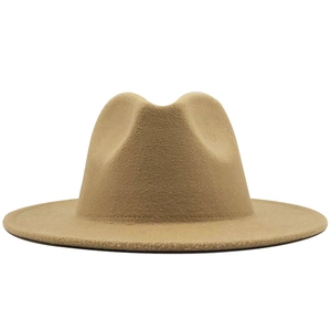 Detail view of khaki wool fedora hat texture and classic flat brim silhouette