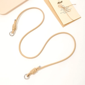 Minimalist beige leather phone crossbody strap with dual silver metal ring clasps