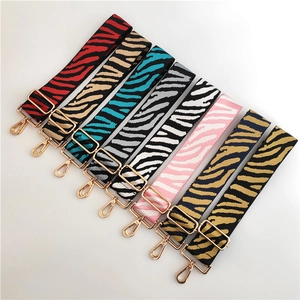 Adjustable wide zebra print crossbody bag straps with gold hardware in eight color options