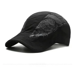 Side view of black quick-dry cap featuring dragon print and laser-cut ventilation holes