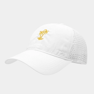 Detail of laser-cut ventilation holes and palm tree embroidery on a white outdoor sports cap
