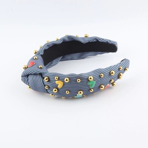Fashionable knot headband with purple stripes and colorful enamel heart charms