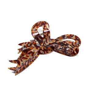 Elegant tortoise shell claw clip with feather leaf design in brown and beige acetate
