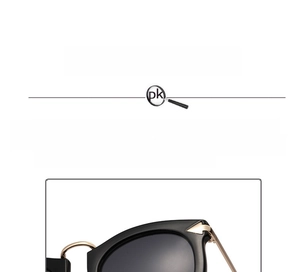 Detail of vintage cat eye sunglasses with golden metal arrow hinges and UV lenses