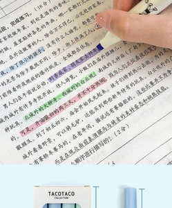 Close-up of colored chisel tip highlighters marking text in a notebook with precision