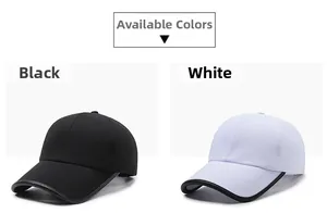 Detail view of cotton baseball caps in black and white with contrast brim piping