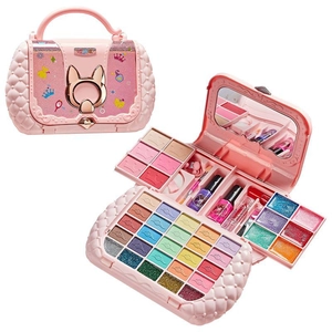 Washable kids makeup kit in pink handbag with eyeshadows, lipsticks and brushes