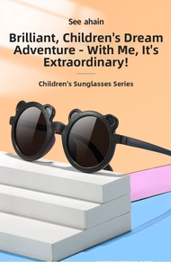 Close-up of black bear-ear shaped kids sunglasses on a minimalist display stand