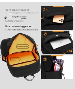 Detail of waterproof Oxford backpack showing orange lining and multiple storage pockets
