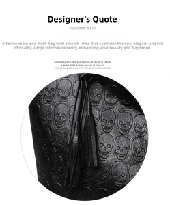 Detail of black embossed leather tote with skull patterns and stylish tassel accent