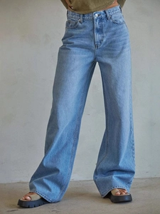 Women's vintage washed light blue high-waisted wide-leg denim jeans in a straight fit