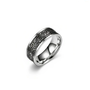 Detailed macro view of retro wave pattern engraved on a titanium steel band ring.
