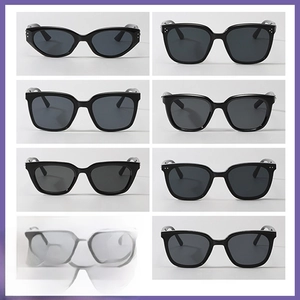 Macro display of seven vintage round sunglasses models with black frames and dark lenses