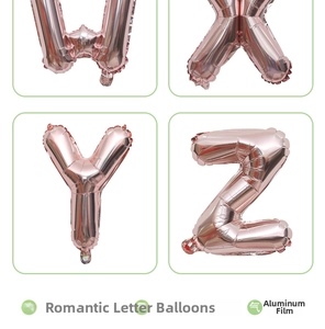 Detail of rose gold foil balloons in letters W X Y Z for birthday party decorations