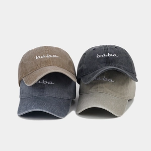 Set of four washed cotton baseball caps with embroidered baba text in vintage dad hat style