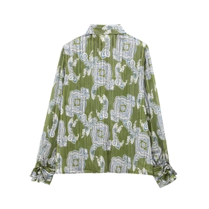 Green paisley printed shirt for women with lapel collar and lace-up cuffs back view