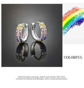 Detail of 925 sterling silver hoop earrings featuring multi-color cubic zirconia stones