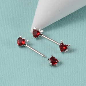 Stainless steel nipple piercing rings with red heart crystals and devil horn design
