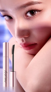 Close-up of fine mascara brush with waterproof formula for long and curly lashes