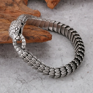 Vintage stainless steel snake scale bracelet in antique silver with snake head clasp