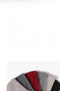 Detailed view of thick winter knitted beanie hats showing multiple color options and soft texture