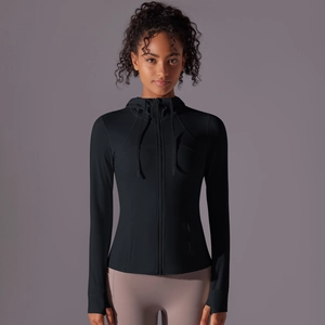 Close-up of black sun protection sports jacket with thumb holes and functional zipper