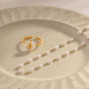 Vintage ABS pearl necklace and floral ring set in gold-tone stainless steel finish