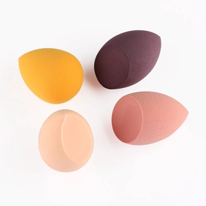 Detailed set of four ultra-soft makeup sponges in waterdrop and teardrop shapes