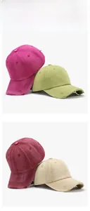 Detail of distressed baseball caps in rose red, green, burgundy and beige colors