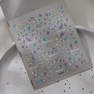 Detailed view of Co-407 colorful 3D crystal nail art stickers with heart and gem shapes