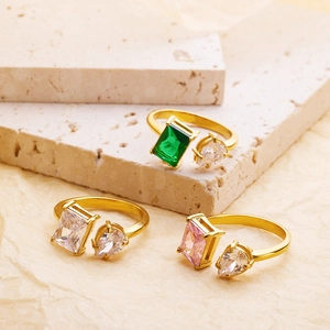 French vintage adjustable gold rings with emerald and pink rectangle gemstones