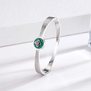 Vintage stainless steel silver bangle with green malachite stone and floral accent