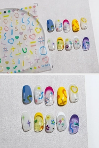 Close-up of 3D embossed nail stickers M-073 featuring colorful hearts and stars patterns