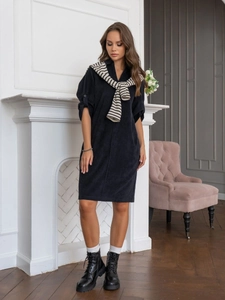 Detail of navy corduroy midi dress featuring buttoned sleeves and a collared neckline