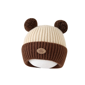 Winter infant knit hat with dual pom-poms and fleece lining in contrast beige and brown