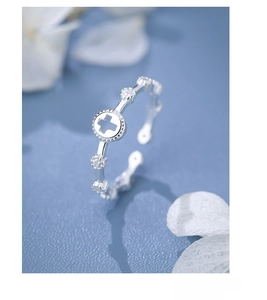 Detailed view of S925 sterling silver hollow cross ring with sparkling zircon accents