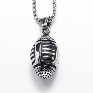 Macro detail of 3D silver stainless steel football pendant with textured box chain