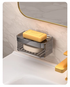 Wall-mounted double-layer grey soap holder with drainage on marble bathroom wall
